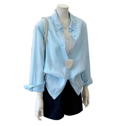 Light blue loose linen long sleeve casual shirt for women, back view showing relaxed silhouette and breathable fabric texture