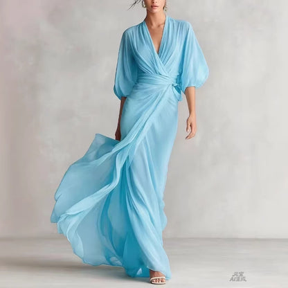 Women's slim-fit A-line long dress in a classic office-ready style, shown from a close detail angle highlighting fabric and f