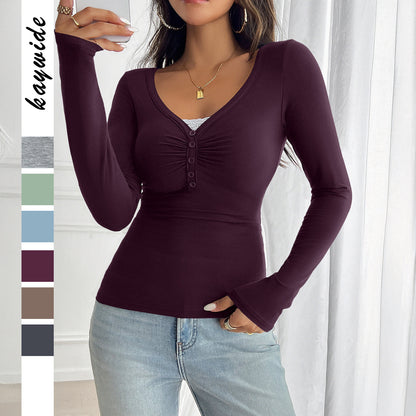 Women's slim fit button knit cardigan with long sleeves in a solid color, showcasing a stretchy ribbed fabric and casual styl
