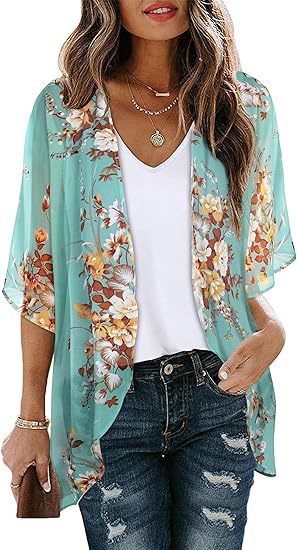 Lightweight floral chiffon cardigan beach cover-up with long sleeves and open front, worn as a sun-protective blouse