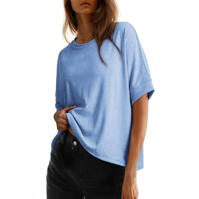 Women's batwing sleeve loose fit cotton top in light grey with round neckline, shown from the back