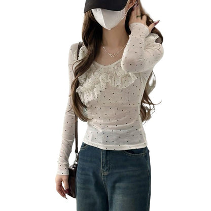 Women's slim-fit long sleeve blouse featuring a polka dot lace fabric in a classic feminine style