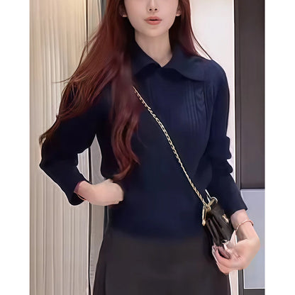 Women's mock neck slim pullover knit sweater in a close-up detail view showing ribbed texture and fitted silhouette