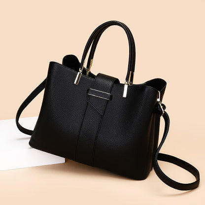 Retro bucket handbag with adjustable crossbody strap in a structured silhouette, women's crossbody bag in neutral tone