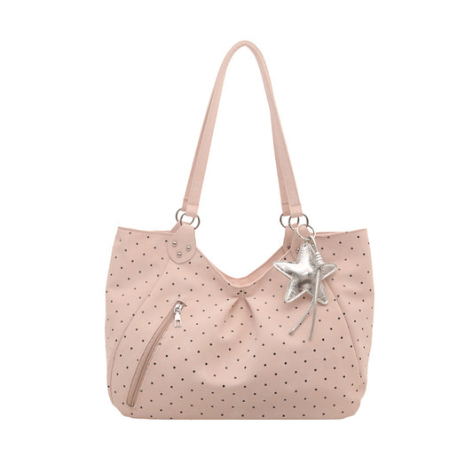 Women's large capacity canvas tote shoulder bag shown from a side angle, highlighting its roomy interior and sturdy handles