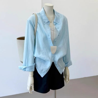 Light blue loose linen long sleeve shirt for women with relaxed fit, a breathable casual top for everyday wear