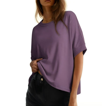 Women's batwing sleeve loose fit cotton top in light grey with round neckline, shown from the back