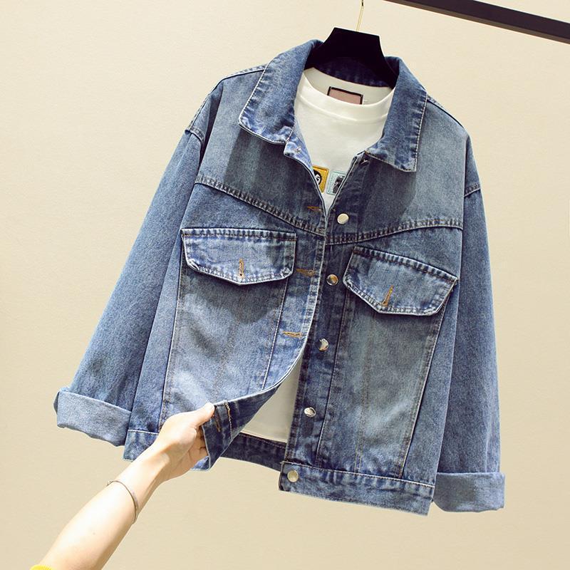 Women's casual loose printed denim jacket with long sleeves, shown in a relaxed everyday style