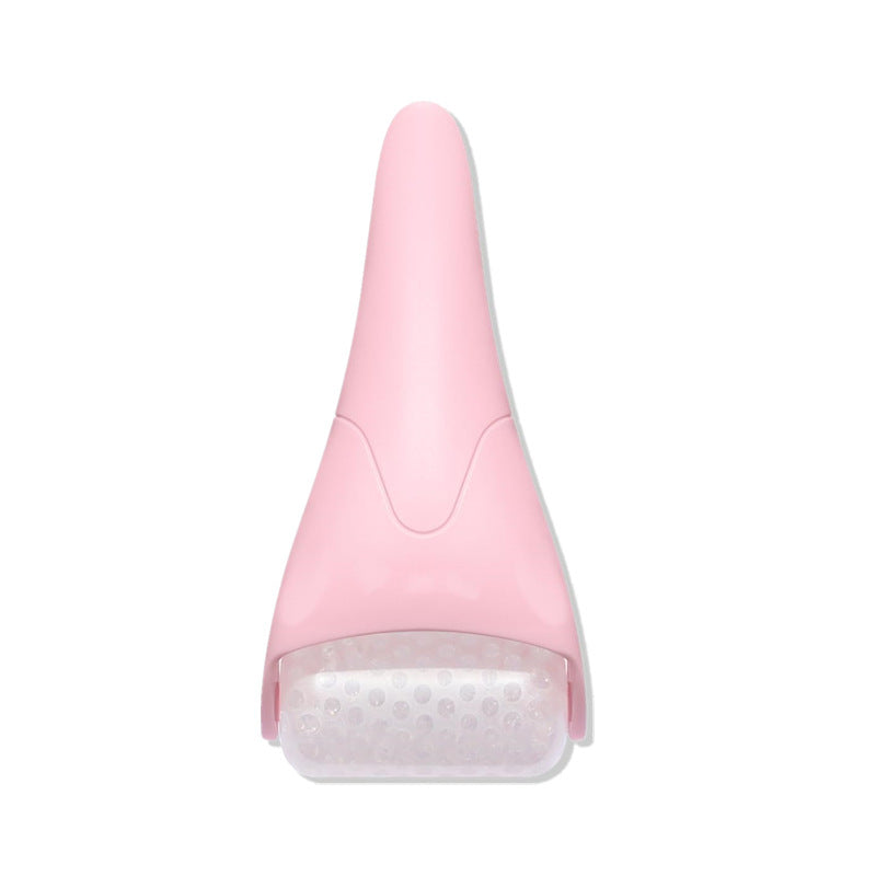 Ice roller massager resting on a white surface, showing the smooth rolling head and handle of the cooling facial massage tool