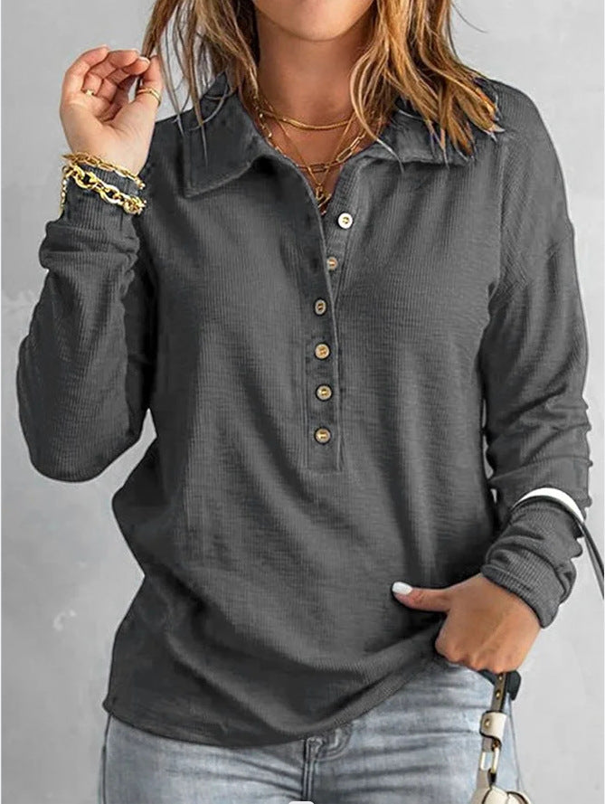 Women's loose fit long sleeve button shirt in solid color, shown from the back to highlight relaxed silhouette and casual eve