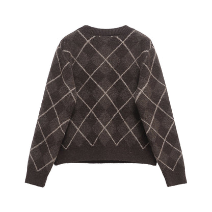 Coffee brown women's crew neck knit sweater with diamond plaid texture, shown in a close-up detail view
