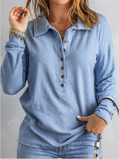 Women's loose fit long sleeve button shirt in solid color, shown from the back to highlight relaxed silhouette and casual eve