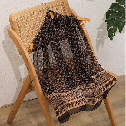 Coffee brown French vintage geometric woven shawl scarf folded flat, showing retro pattern detail