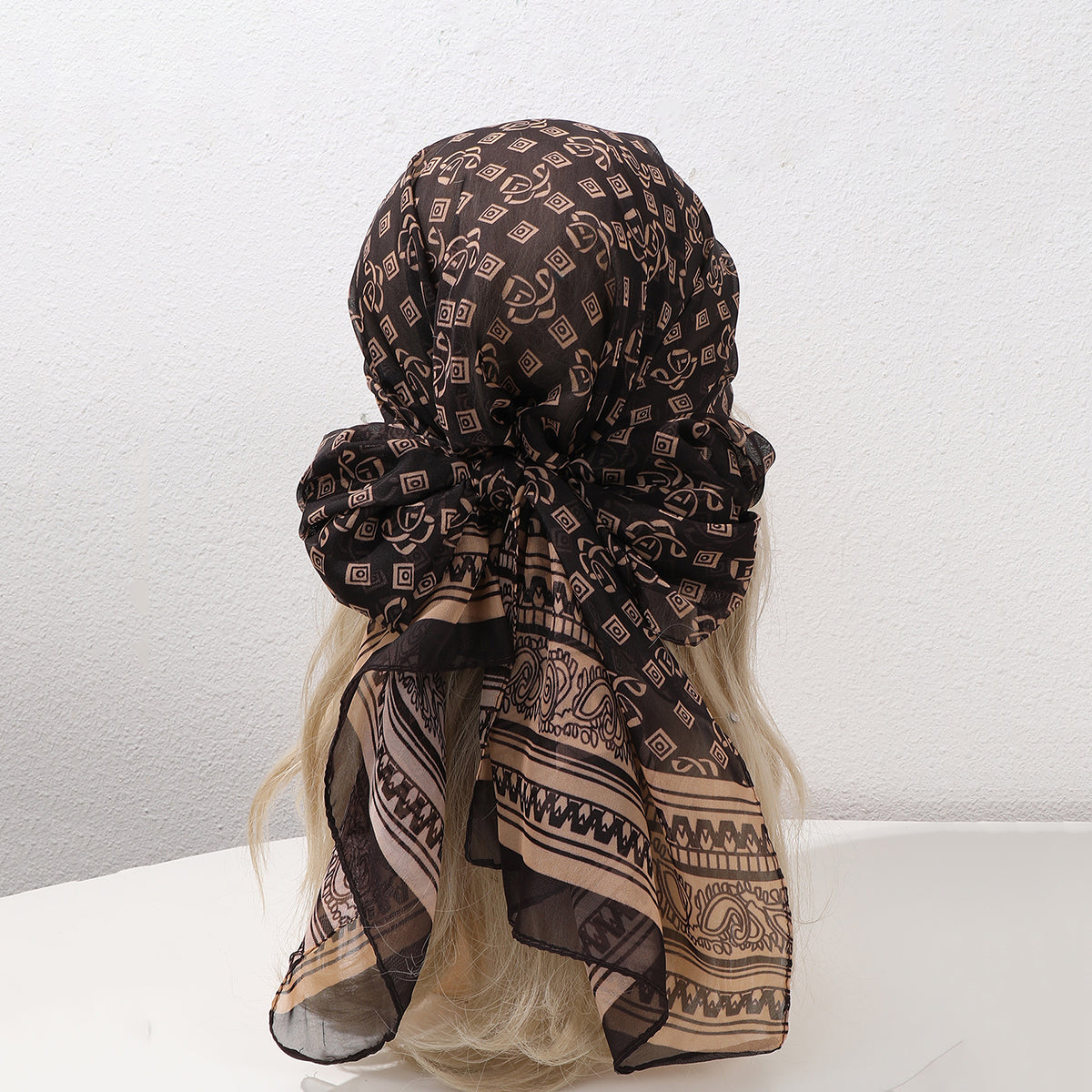 Coffee brown French vintage geometric woven shawl scarf draped as a wrap, featuring a retro pattern