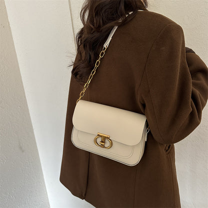 Korean-style personalized women's shoulder bag in PU leather, shown from the side highlighting its structured silhouette and 