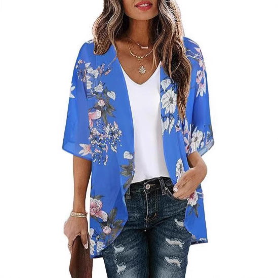 Sheer floral chiffon cardigan beach cover-up draped open, showing lightweight sun-protective fabric in a breezy boho style