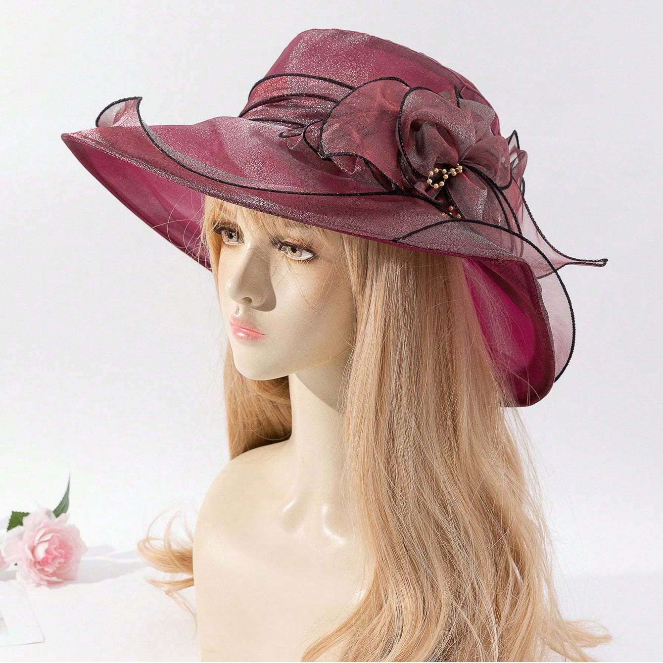 Chiffon flower fisherman hat shown from a side angle, highlighting the floral trim and lightweight fabric of this women's sun