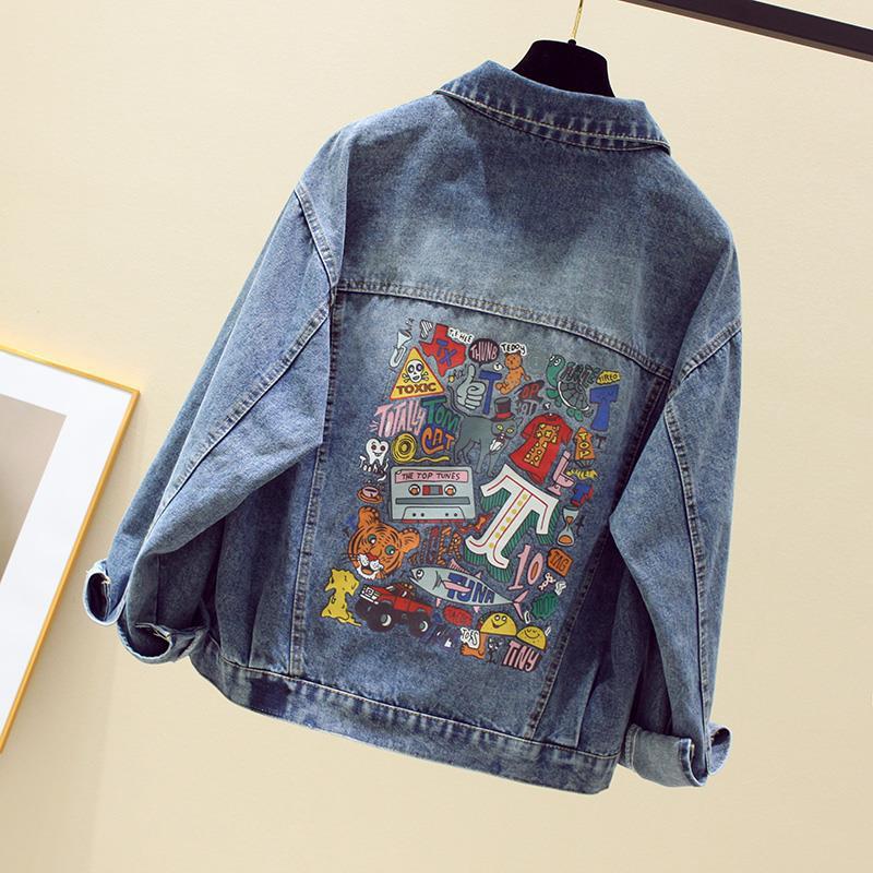 Women's casual loose printed denim jacket with long sleeves, shown from the back to highlight the graphic print detail.