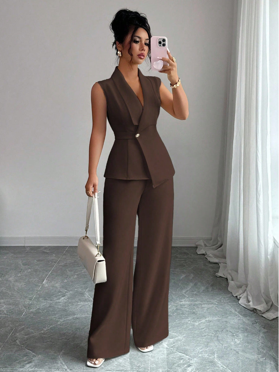 Women's sleeveless blazer and straight-leg pants two-piece set shown as a coordinated workwear outfit for a polished office l