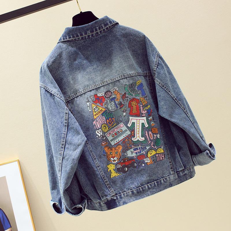 Women's casual loose printed denim jacket with long sleeves, shown in a relaxed everyday style