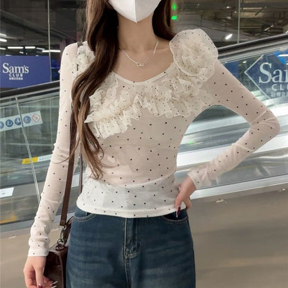 Women's slim-fit long sleeve blouse featuring a polka dot lace design, shown as a stylish everyday top for women