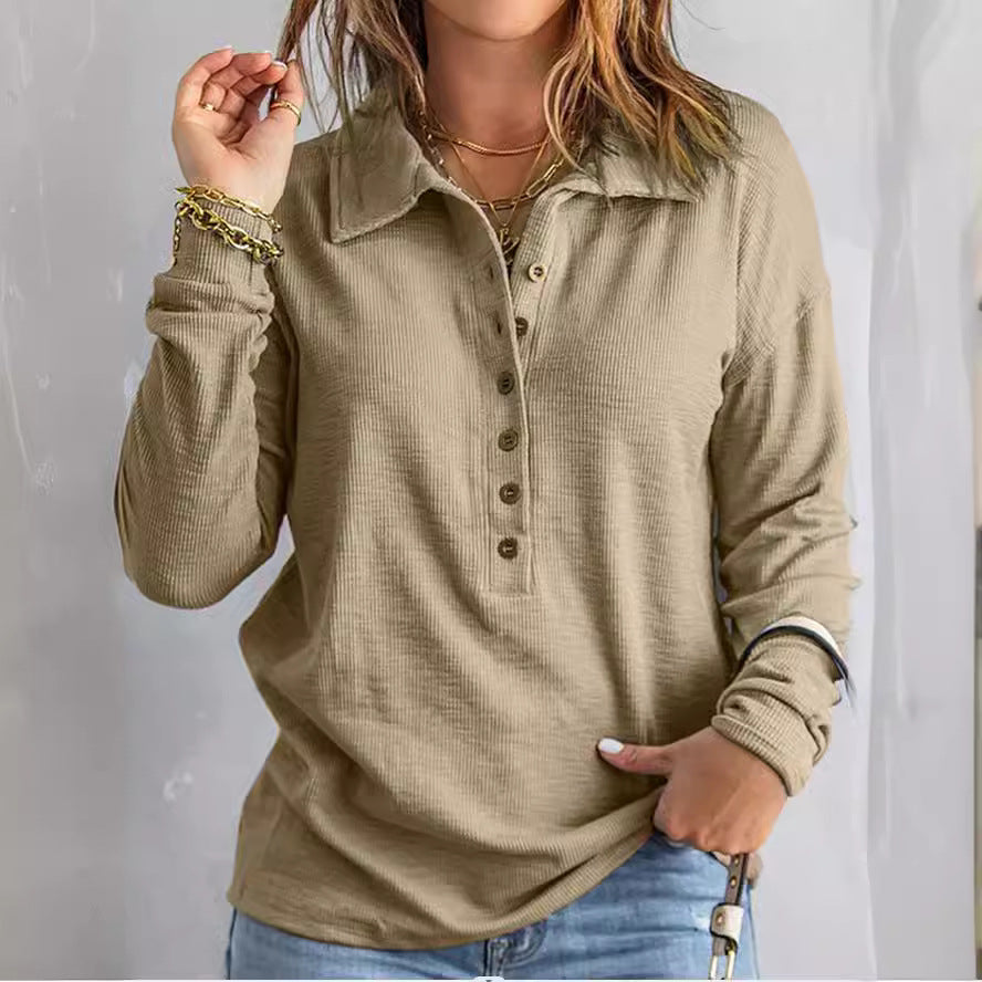 Women's loose casual long sleeve button shirt in a solid color, front view showing relaxed fit and simple everyday style.