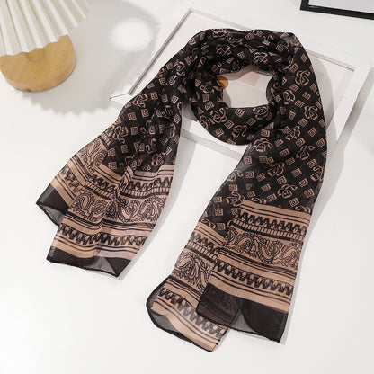 Coffee brown French vintage geometric woven shawl scarf folded to highlight retro pattern detail