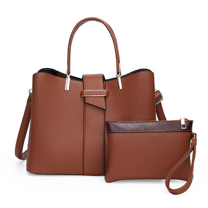 Retro bucket handbag with detachable crossbody strap shown from the side, highlighting its structured silhouette and vintage-