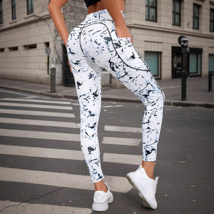 Women's high-waist tummy control leggings shown from the back, highlighting the color block design and butt-lifting fit for w