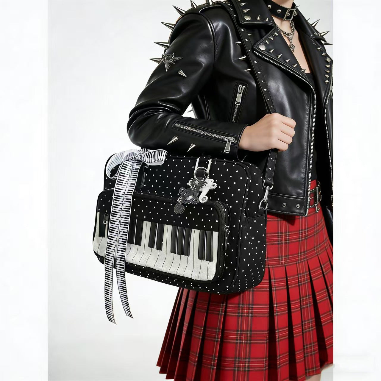 Lightweight polka dot piano key shoulder bag in black and white, casual women's everyday bag with structured silhouette