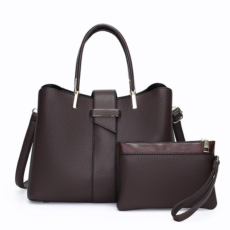 Retro bucket handbag with detachable crossbody strap shown from the side, highlighting its structured silhouette and vintage-