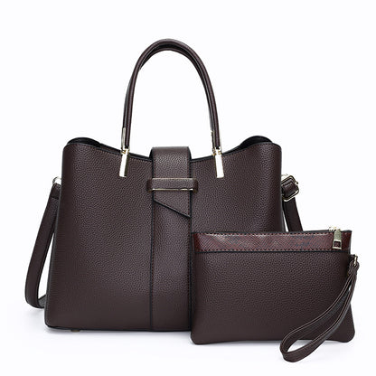 Retro bucket handbag with detachable crossbody strap shown from the side, highlighting its structured silhouette and vintage-