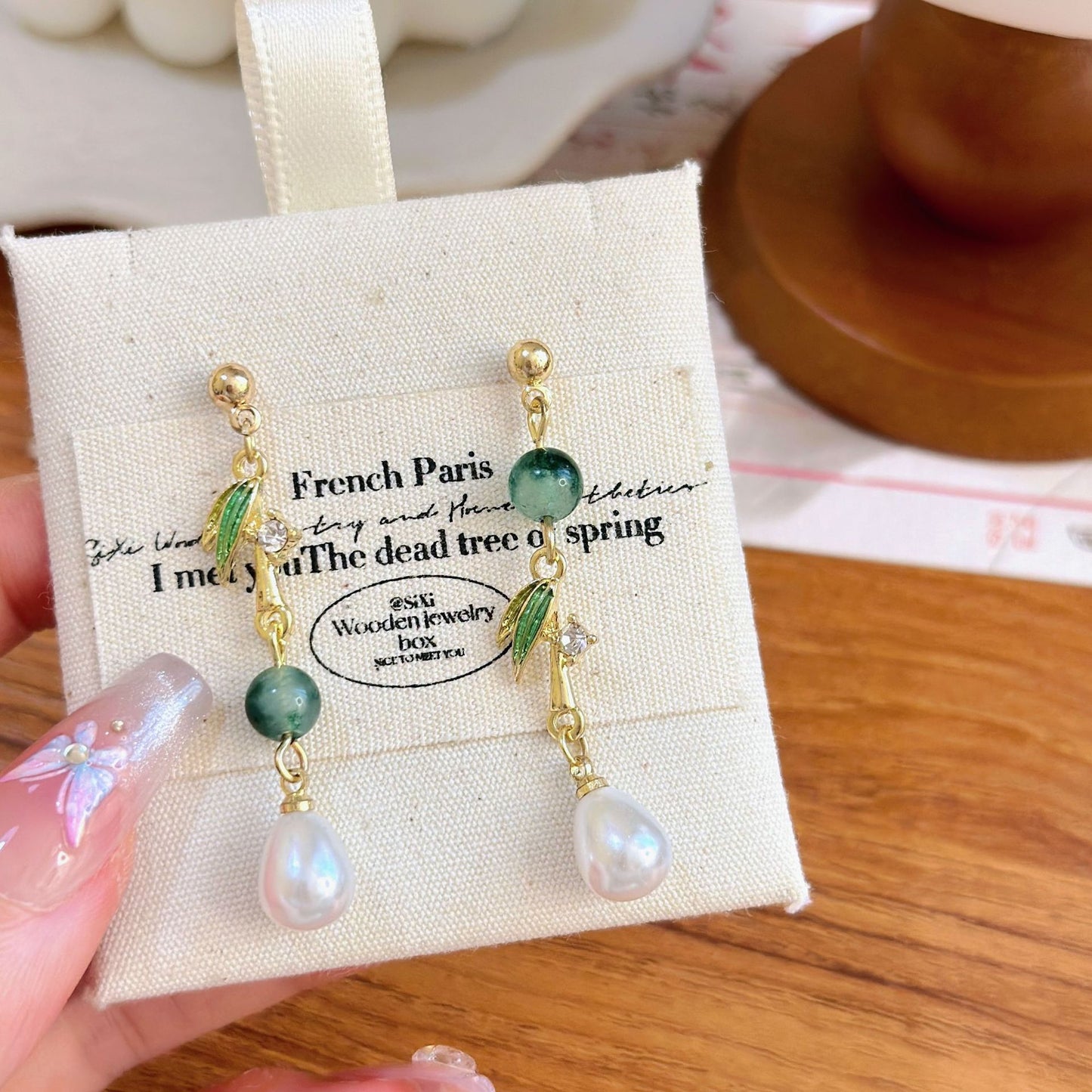 Bamboo leaf pearl drop earrings with alloy leaf detail and elegant pearl accent in vintage Chinese style