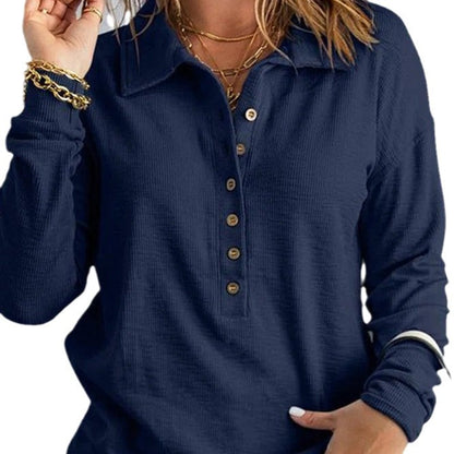 Women's loose fit long sleeve button shirt in a solid color, shown from the back to highlight the relaxed silhouette