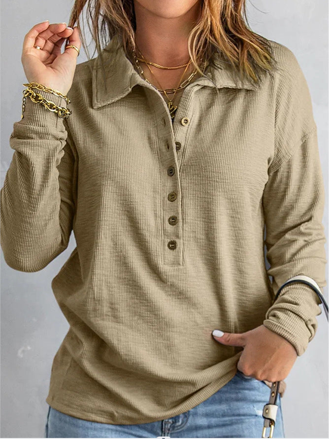 Women's loose fit long sleeve button shirt in solid color, shown from the front with a relaxed casual silhouette
