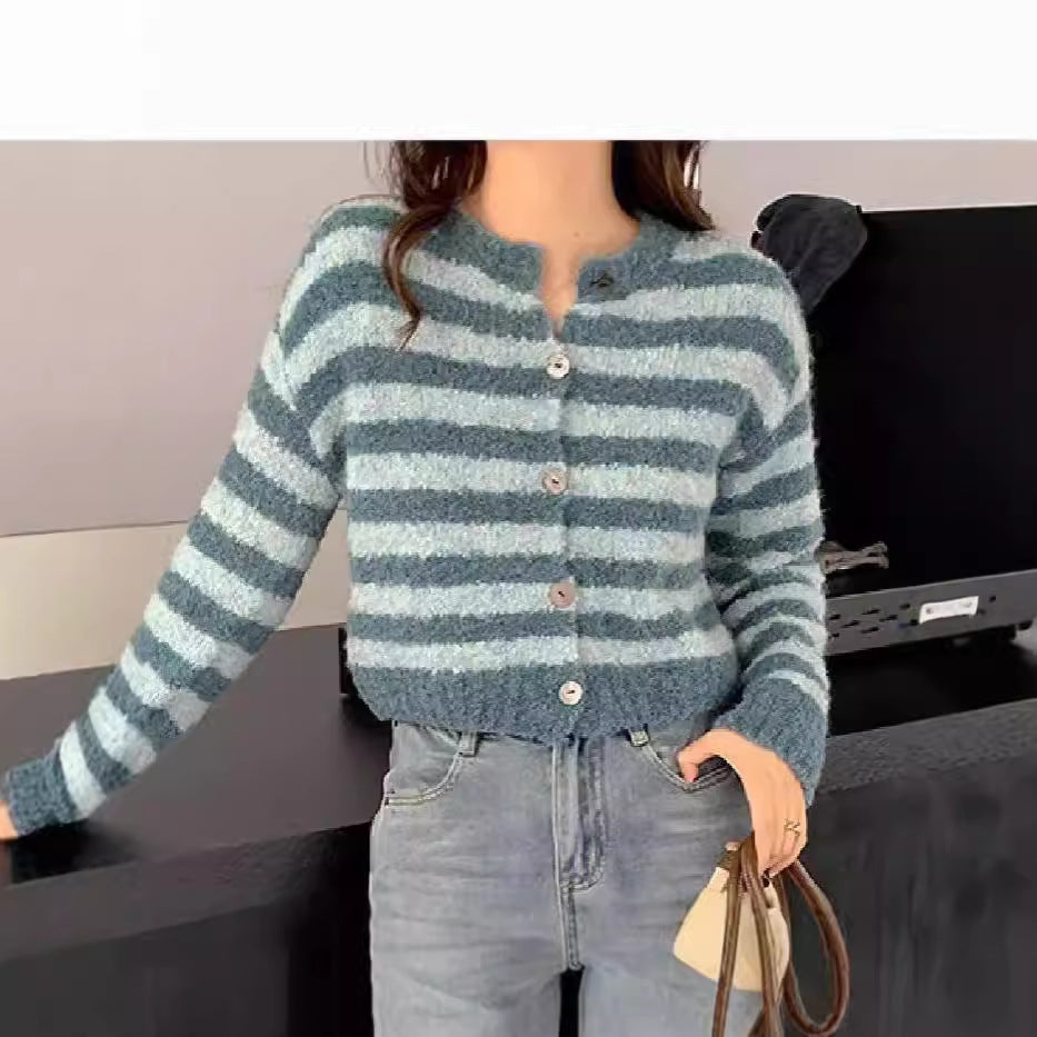 Women's chunky knit short cardigan sweater in a cozy open-front style, shown from the front