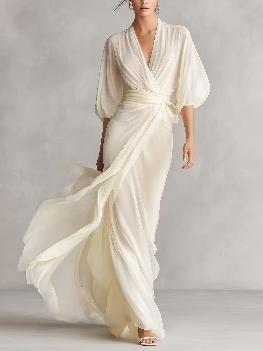 Women's slim-fit A-line long dress in a classic office-ready style, shown from a close detail angle