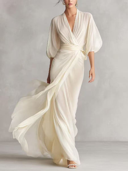 Women's slim-fit A-line long dress in a classic office-ready style, shown from a close detail angle